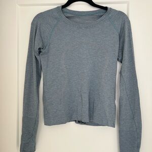 Swiftly Tech Long-Sleeve Shirt 2.0
Waist Length